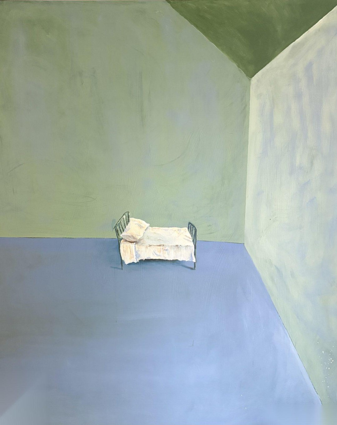 Bed in an Empty Room